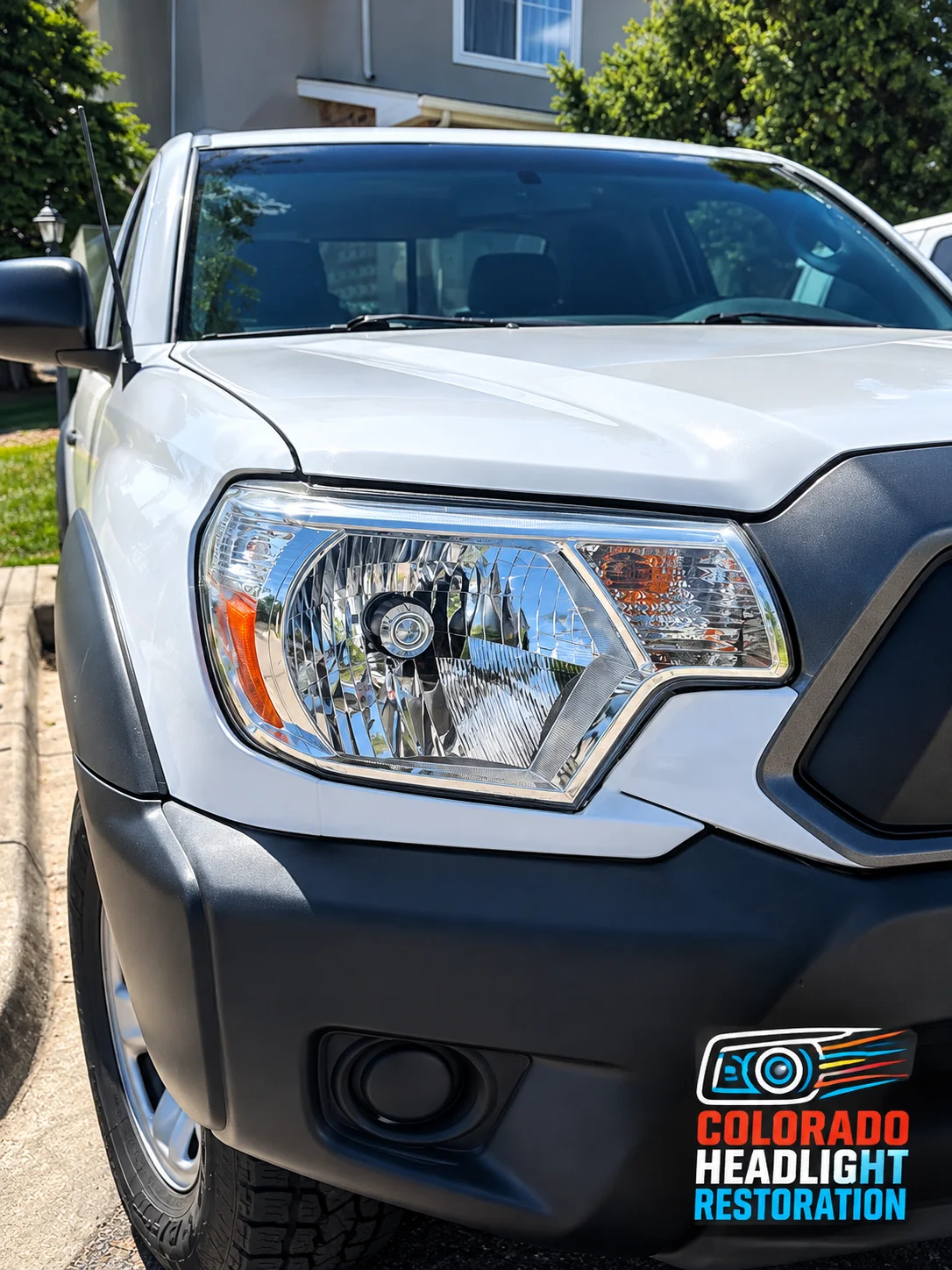 White pickup headlight lens after restoration