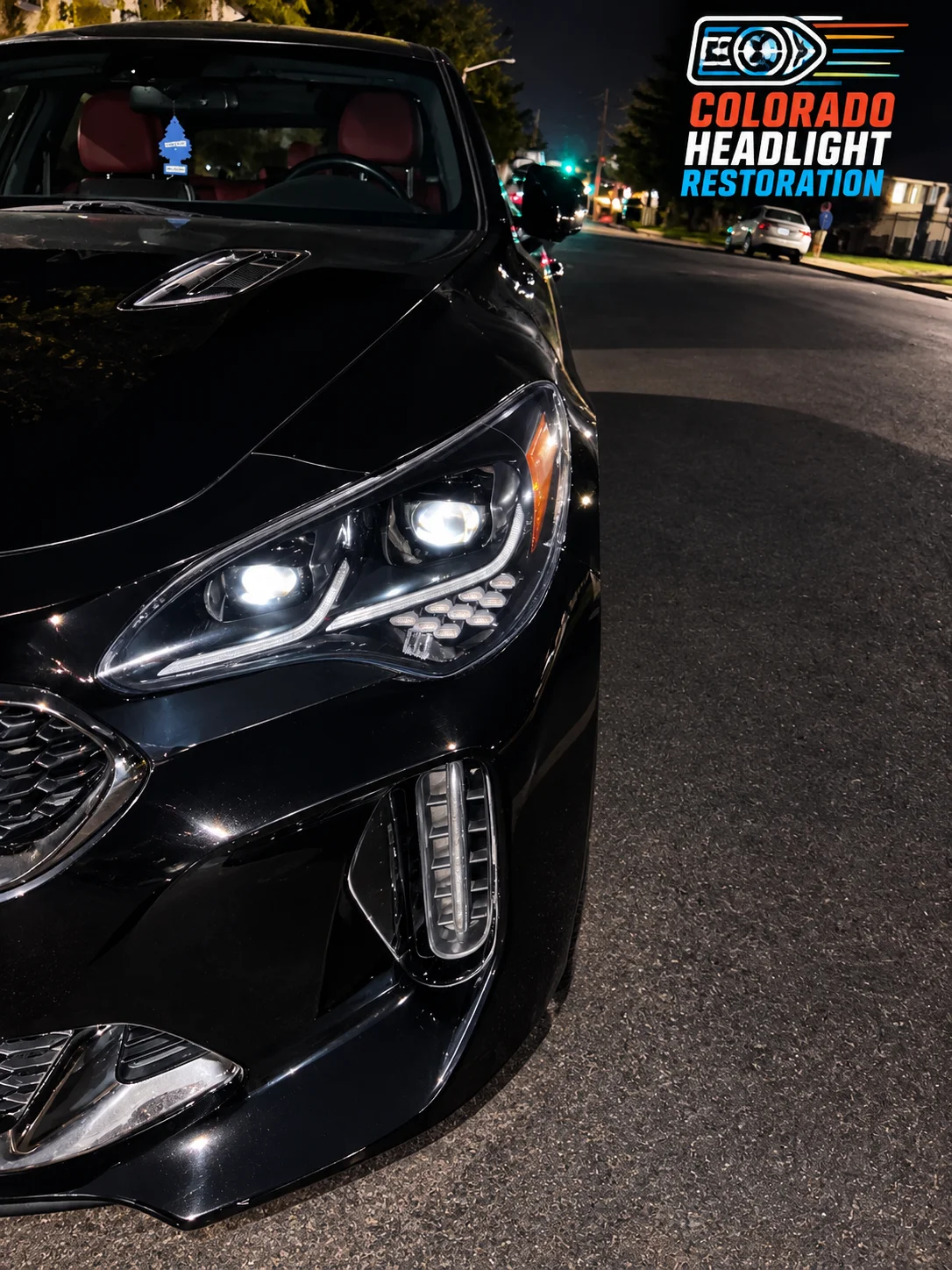 Black SUV front corner with clear headlight lens