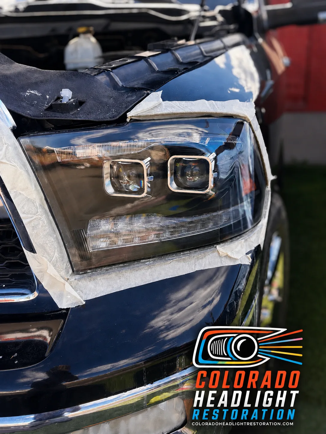 Pickup headlight with paper and blue tape masking during restoration